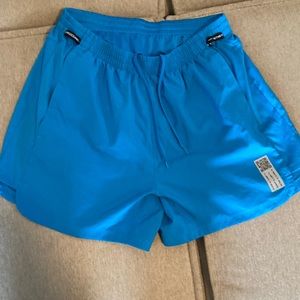 Blue adidas running shorts